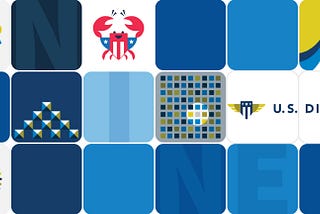 Blocks in three horizontal lines resemble the sides of  a Rubik’s cube. Various graphic images with squares and blocks. A crab with a red and white striped shield and white on blue stars. The word “NINE” is spelled out. “U.S. Digital Service”