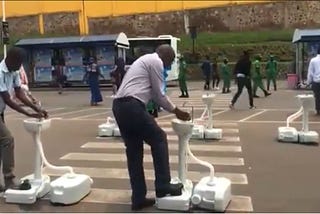 Wash Your Hands On The Walk:: Rwanda Installs Portable Washbasins In Public