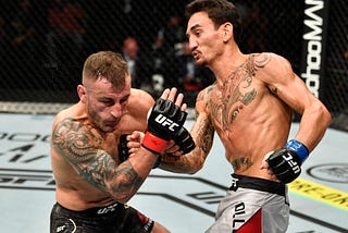 Max Holloway won on Saturday night, but the judges disagree. Lets talk about it.