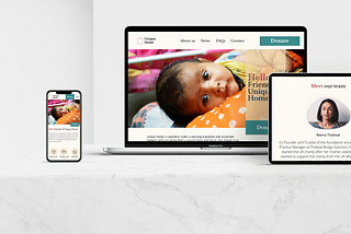 A phone, laptop and iPad showing mock up screens of a charity website