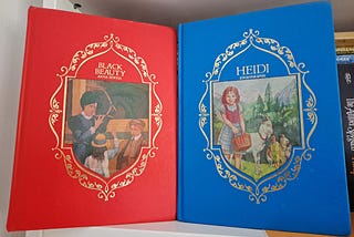 The two books, one red and one blue