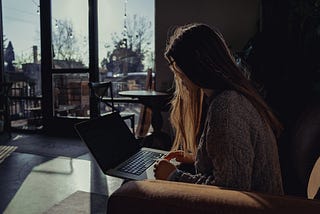 Woman typing on keyboard. Public relations.