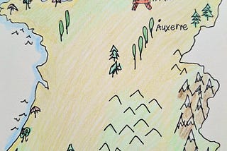 Pen and coloured pencil sketch of France. Paris is marked with a cartoon Eiffel Tower. Auxerre with a dot, is marked south west of the capital. The map is decorated with snow-topped mountains, green hills, trees and sun shades near the coasts, fringed with blue waves.