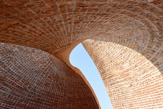 Twisted Brick Shell Concept Library: A Fusion of Traditional Materials and Modern Design by HCCH…