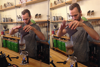 man pouring powdered coffee into beaker
