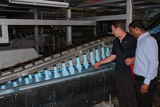 Eagle Protect CEO inspecting nitrile glove manufacturing line