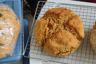 Three uncut loaves of soda bread