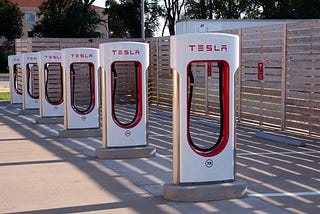 A row of Tesla charging stations