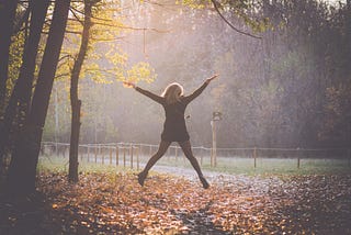 Woman jumping for joy