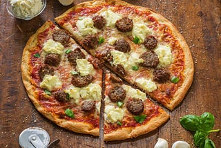 Introducing Our Irresistible Meatballs Pizza: Order Now and Elevate Your Pizza Experience!