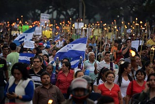 Protests light up long Honduran night