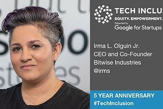 A Tech Inclusion speaker card featuring a photo of Irma L. Olguin Jr., smiling into the camera and wearing a black shirt.