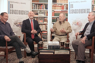 Three neuroscientists and a magician sitting in a library discussing consciousness and magic.