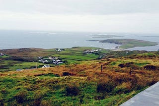 An expanse of Irish farmland jutting into the sea.