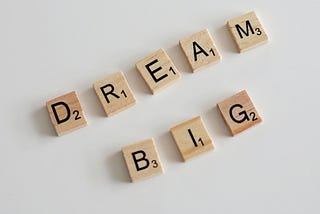 Wooden cubes with letter reading DREAM BIG