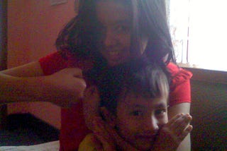 Me with my 3 year old cousin ~2008 clicked on my Motorola mobile ;)