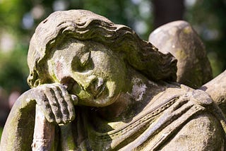 Statue of a crying angel