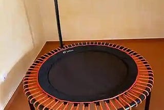 Bellicon trampoline with orange bungees
