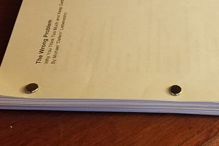 Picture of The Wrong Problem book manuscript on a table