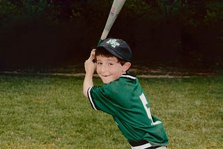 Author playing his first year of organized baseball at age 7.