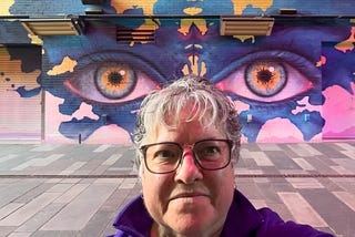 Author in Dairy Block, Denver, Napolitano Art mural