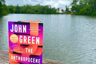 John Green’s The Anthropocene Reviewed with Mariner’s Lake behind it
