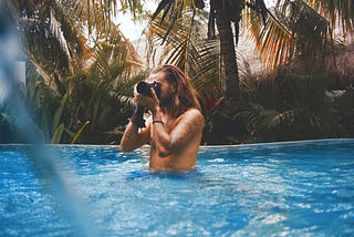 6 Common Mistakes to Avoid as a First-Time Digital Nomad — man taking picture in pool