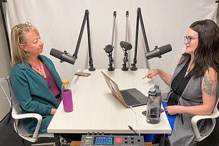 Maria Kingery and Alisa Herr sitting across from each other during the podcast interview.