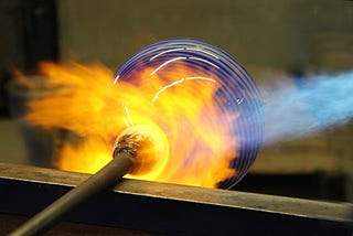 Photo of glassblowing.