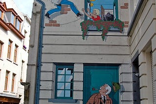 The side of a building covered in a cartoon depiction.