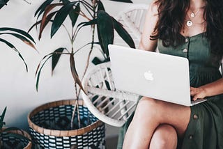 A young woman working at her laptop