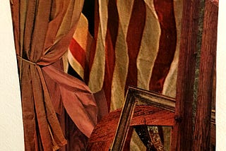 Collage with American flag, pieces of wood.