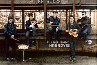 Famous photo of the Beatles in Hamburg as 5 member band with Pete Best and Stuart Sutcliffe in add to John, Paul, George.