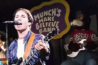 Desperate: Chuck E. Cheese’s Pizzeria rebrands as “Paul Simon’s Pizzeria”