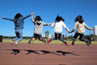 Kids jumping outside