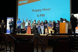 Boulder Theater with staff on stage at UX Strat Conference