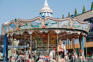 A ornately decorated carousel. Customer service is like a merry-go-round.