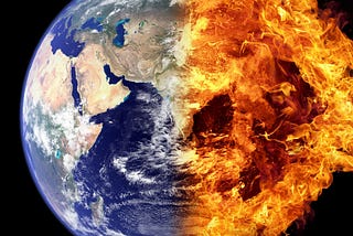 Globe of planet Earth, half ablaze.