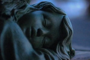 When Sleep Visits Her (Poem)