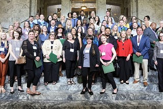 Around 50–75 people gathered outside the Washington State Capitol for the PSRW award ceremony.