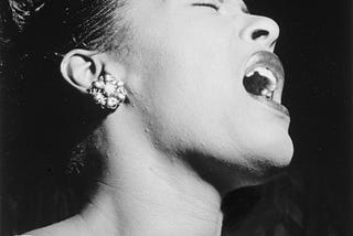 Photo of Billie Holiday singing. Image by <a href=”https://pixabay.com/users/fotoshoptofs-2171839/?utm_source=link-attributio