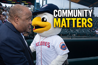 Dominic Carter with Brooklyn Cyclones mascot highlighting community engagement and leadership