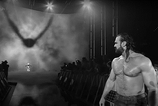 Drew McIntyre looks up the ramp as everything turns greyscale.