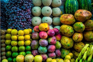 Fruits in a store groupped by their type