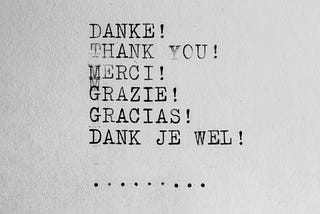 Typewritten text with thank you written in 6 different languages