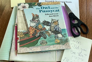 Copy of Owl and the Pussycat by Edward Lear, illustrations by Jan Brett, with notes and scissors indicating someone is making comments about it.