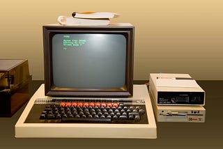 Old computer with computer text