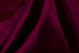 purple textile on white textile