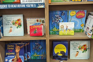 Image of children’s display bookshelf with favorite titles featured.