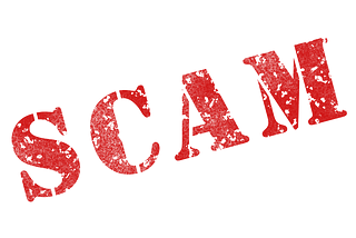 Ink stamp of the word “scam”.